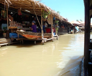 The floating market was a market place that was on the water and visitors shopped by rowing a boat up to each stall. 